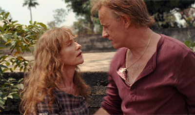 STILL # 3 Isabelle Huppert as “Maria Vial” and Christopher Lambert as “André Vial” in WHITE MATERIAL directed by Claire Denis Photo Credit: © An IFC Films Release (Click to enlarge)