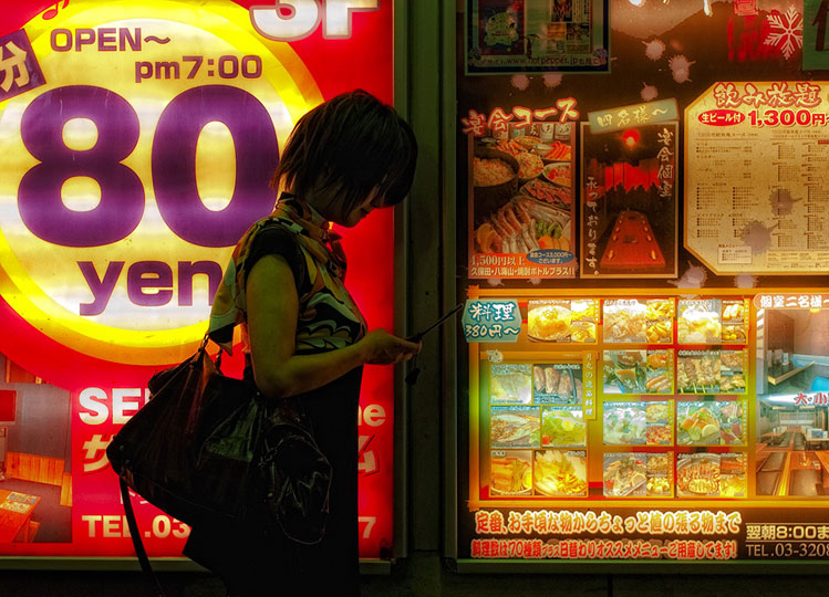 Shinjuku Kitai (girl with cell phone) © William J Palank