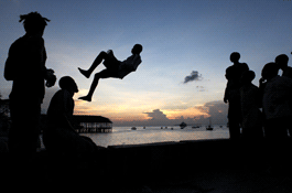 THUMB1109262895-Julia-Cumes-J_Cumes_Harbor_Jumping_Zanzibar