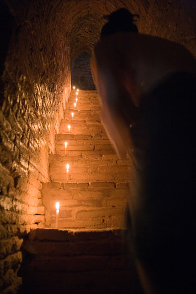 Temple Keeper on stairs, Valley of Temples, Burma. © Andrew Geiger