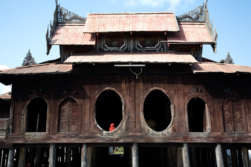 Monk in Monastery Window near lake Inle, Burma. © Andrew Geiger