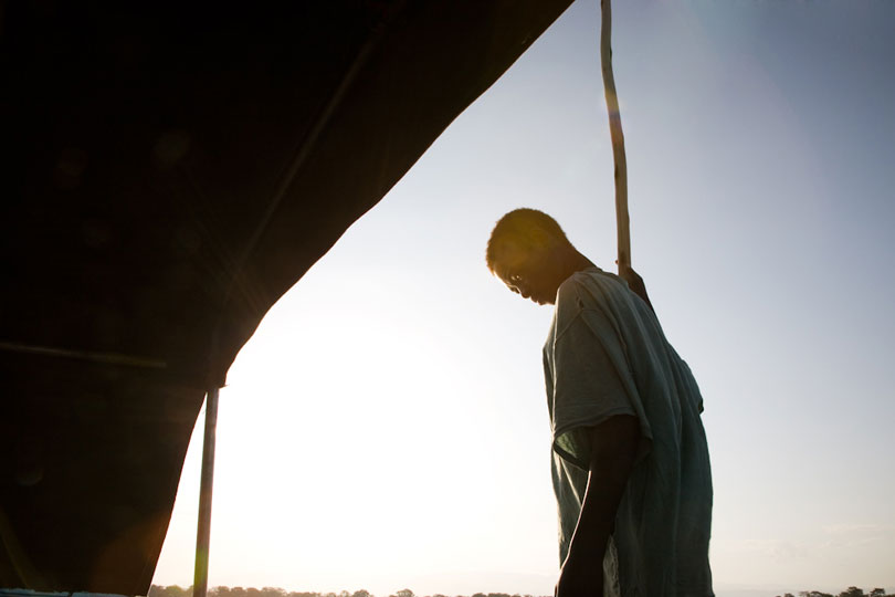 Boatman at sunrise, Ethiopia. © Andrew Geiger