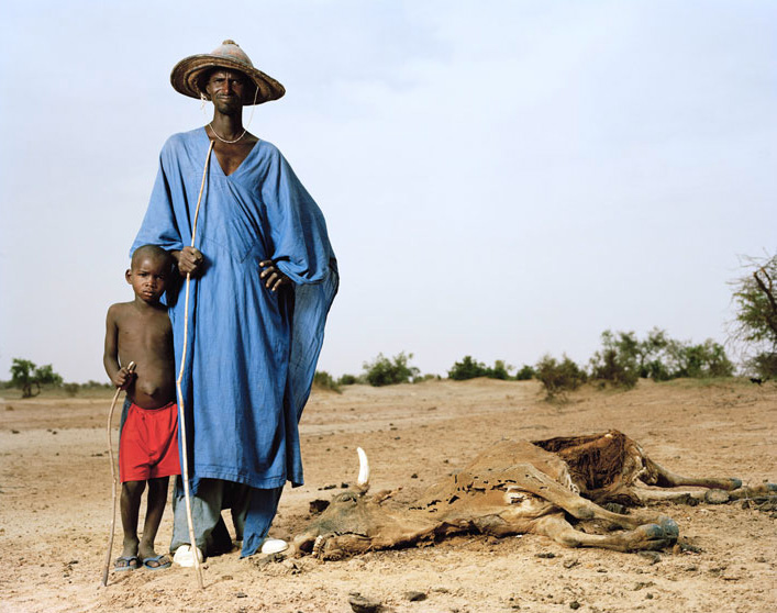 Gouro Modi, cow herdsman, with his son Dao. Korientze, Mali.