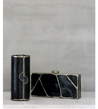 Black shell minaudiere with brass detail