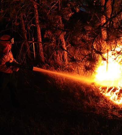 U.S. Air Force Academy firefighters fight the Black Forest Fire Colorado Springs, CO, June 12, 2013.