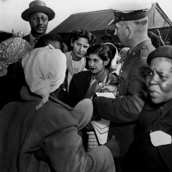 Jurgen Schadeberg, The 29 ANC Women’s League women are being arrested by the police for demonstrating against the permit laws, which prohibited them from entering townships without a permit, and were later kept in Boksburg Prison for 14 days, 26th August 1952, Courtesy the artist.